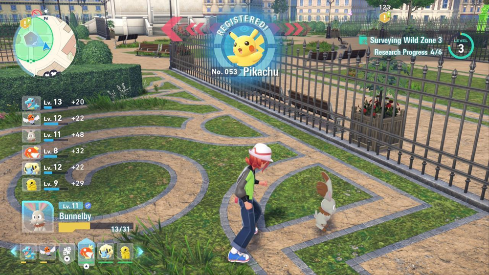 After catching a Pokémon, the HUD shows Pikachu registered as Pokédex No. 053 with a ‘Registered!’ banner, and the party Pokémon list on the left gaining experience points (levels and EXP values displayed) while in Wild Zone 3.