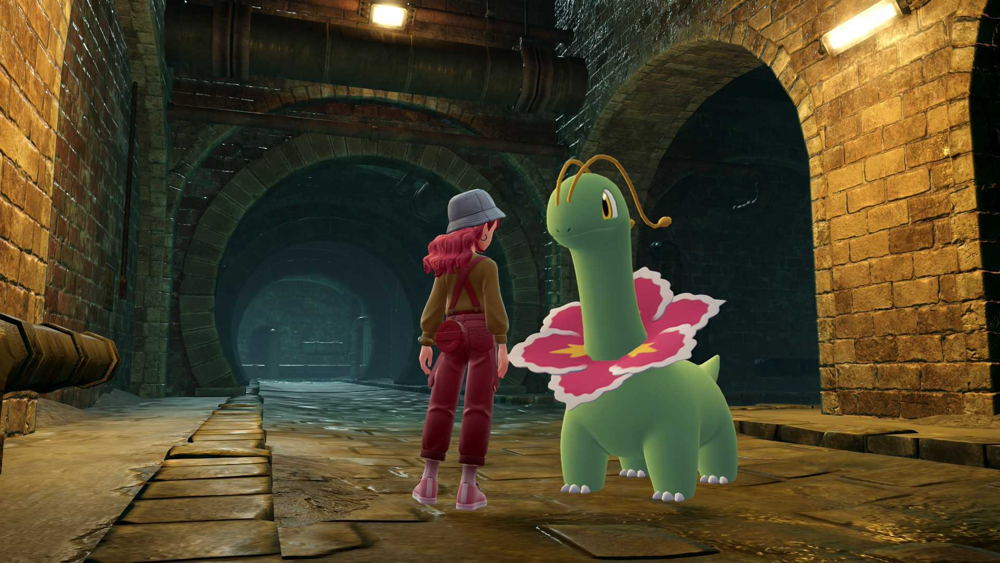The player character and a Meganium stand in the dimly lit brick archways of the Lumiose City sewers, water underfoot and tunnels stretching ahead.